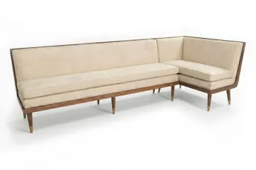 Custom dining banquette with exposed wood frame and tapered base. Available in left, right, or bespoke configurations.