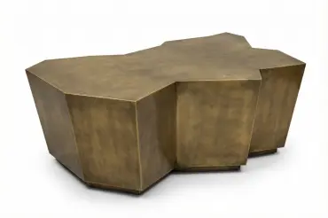 Edge Cocktail Table features bold faceted geometry, antique brass finish, and fully customizable metal fabrication for a striking modern centerpiece.