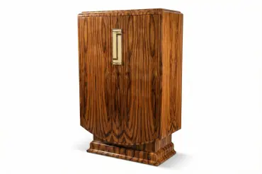 Inspired by 1930s Paris, the Montaigne Cabinet features book-matched Santos Rosewood, shagreen-lined drawers, and architectural nickel hardware.